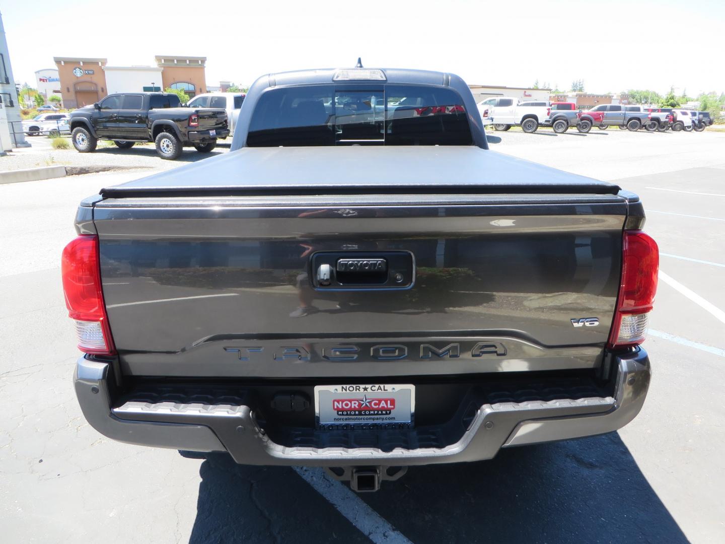 2017 CHARCOAL /GREY Toyota Tacoma TRD OFF-ROAD Double Cab Long Bed V6 6AT 4WD (3TMDZ5BN3HM) with an 3.5L V6 engine, automatic transmission, located at 2630 Grass Valley Highway, Auburn, CA, 95603, (530) 508-5100, 38.937893, -121.095482 - TRD Off-road Tacoma with a level kit, 17" Fuel Vector wheels, Falken Wildpeak AT tires, N-Fab running boards, Roll Up tonneau cover, BedRug, and window Deflectors. - Photo#5